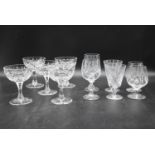 A set of 20th century cut crystal glasses. To include, five champagne coupes and three