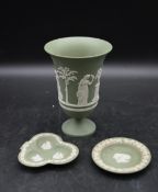Three pieces of Wedgwood Jasperware. To include a vase and two trinket dishes with Classical