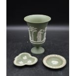 Three pieces of Wedgwood Jasperware. To include a vase and two trinket dishes with Classical