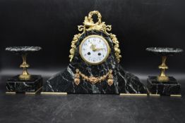 H. Perrin - A 19th century French garniture marble mantel clock and tazza form side pieces,