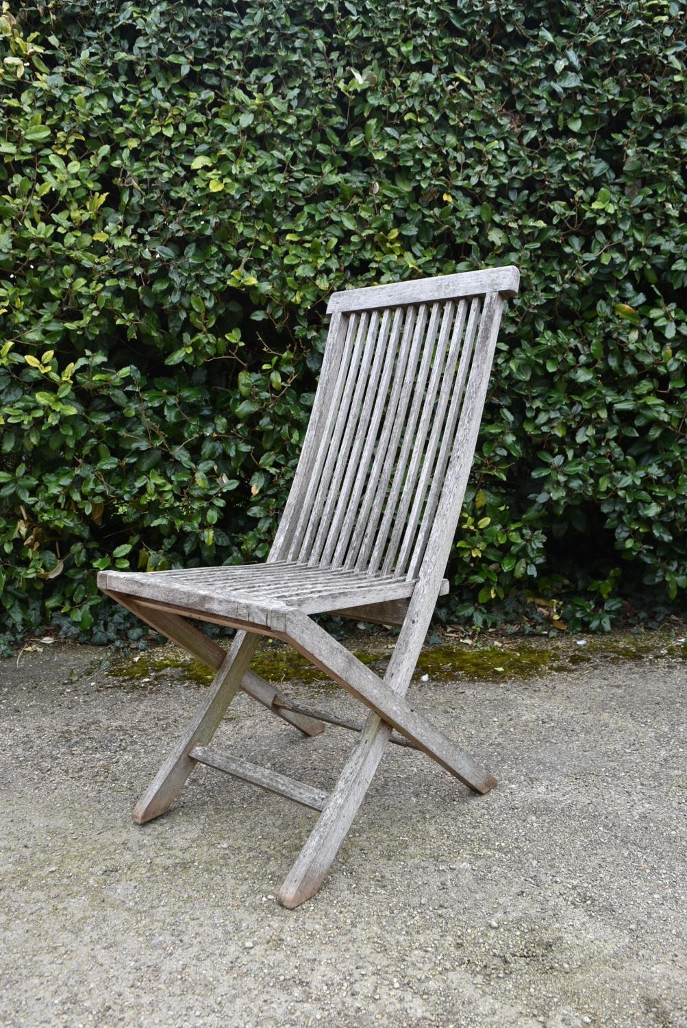 A set of five weathered teak folding and slatted garden chairs. H.99 W.46 D.43cm - Image 6 of 7