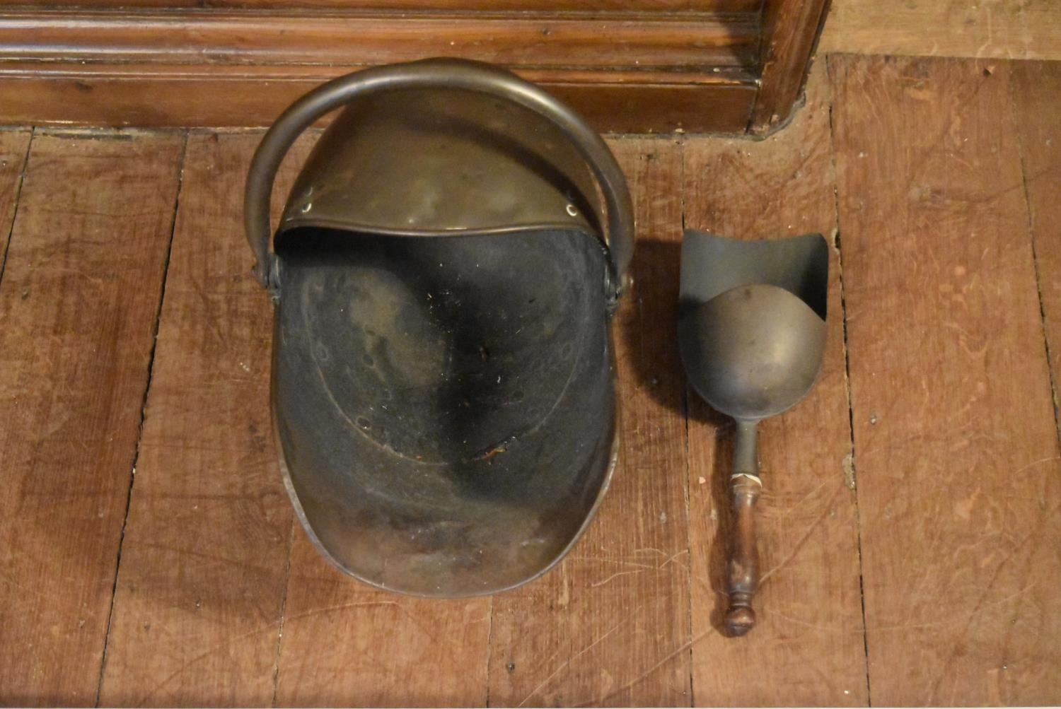 A Victorian helmet shaped brass coal scuttle with shovel. H.40 W.47cm (2) - Image 4 of 6