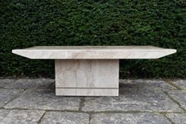 A vintage travertine marble low table on pedestal base. H.40 W.126 D.65cm