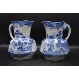 A pair of 19th century blue and white 'Masons' ironstone Hydra jugs, decorated with forest scenes,