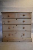 A 19th century pine chest of drawers on plinth base. H.102 W.107 D.54cm