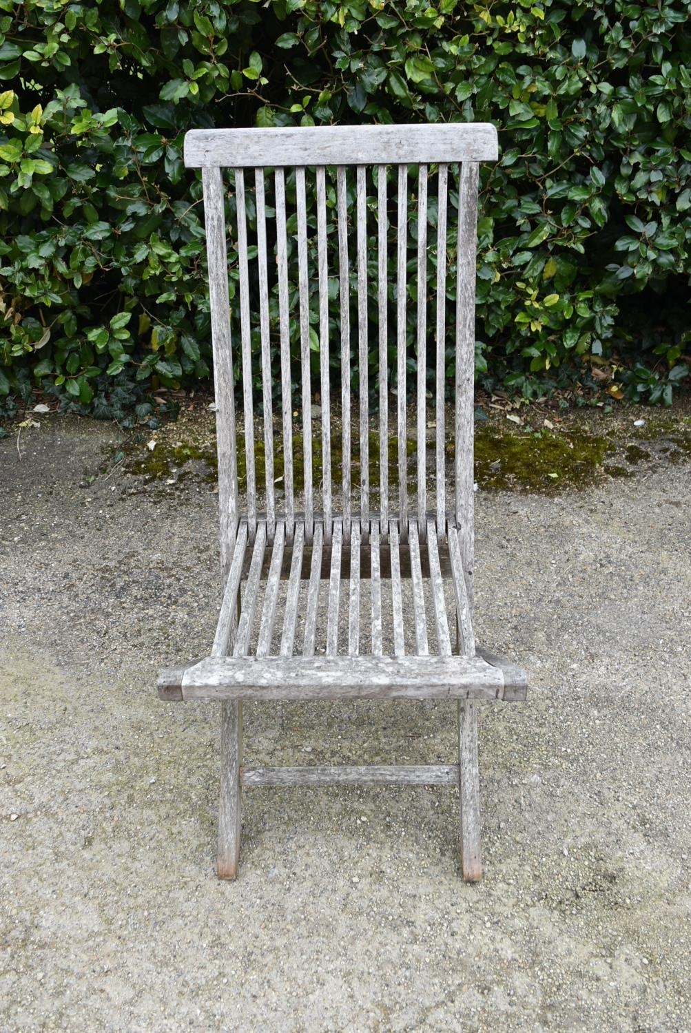 A set of five weathered teak folding and slatted garden chairs. H.99 W.46 D.43cm - Image 4 of 7