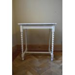 A white painted mid century side table on barley twist supports. H.74 W.70 D.43cm