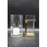 Two contemporary glass candle holders. To include a square glass candle holder designed by David