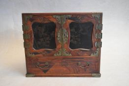 A 19th century Chinese metal bound and parquetry table top jewellery cabinet with hand decorated