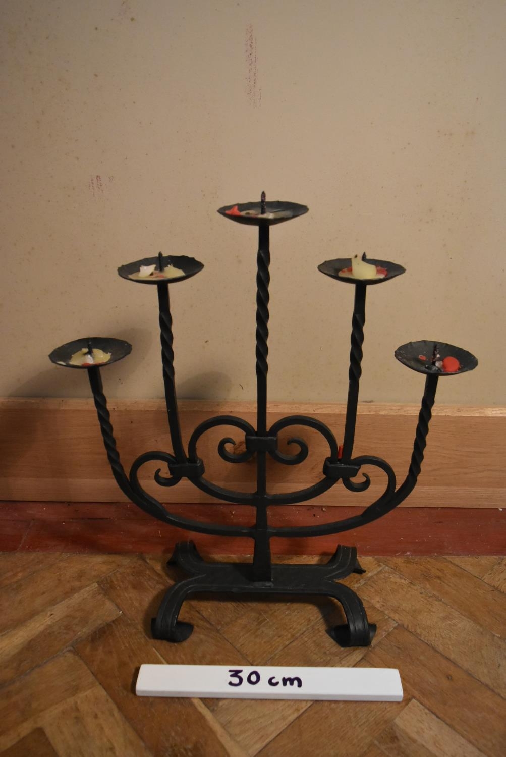 A 20th century five branch iron candelabra, stylised with twist branches and swirl design. H.54 W. - Image 7 of 7