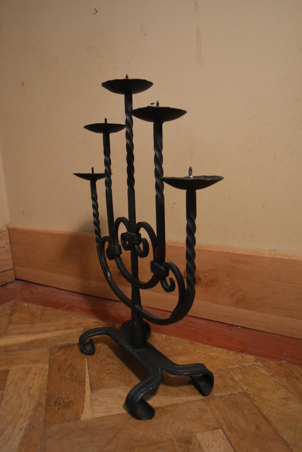 A 20th century five branch iron candelabra, stylised with twist branches and swirl design. H.54 W. - Image 3 of 7