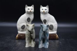 A pair of Takahashi Japan San Francisco Staffordshire cat bookend figures, along with a pair