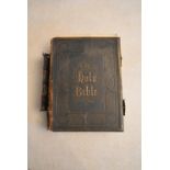 A 19th century Henry & Scott hardcover Holy Bible with gilt decoration and brass clasps. H.37 W.25