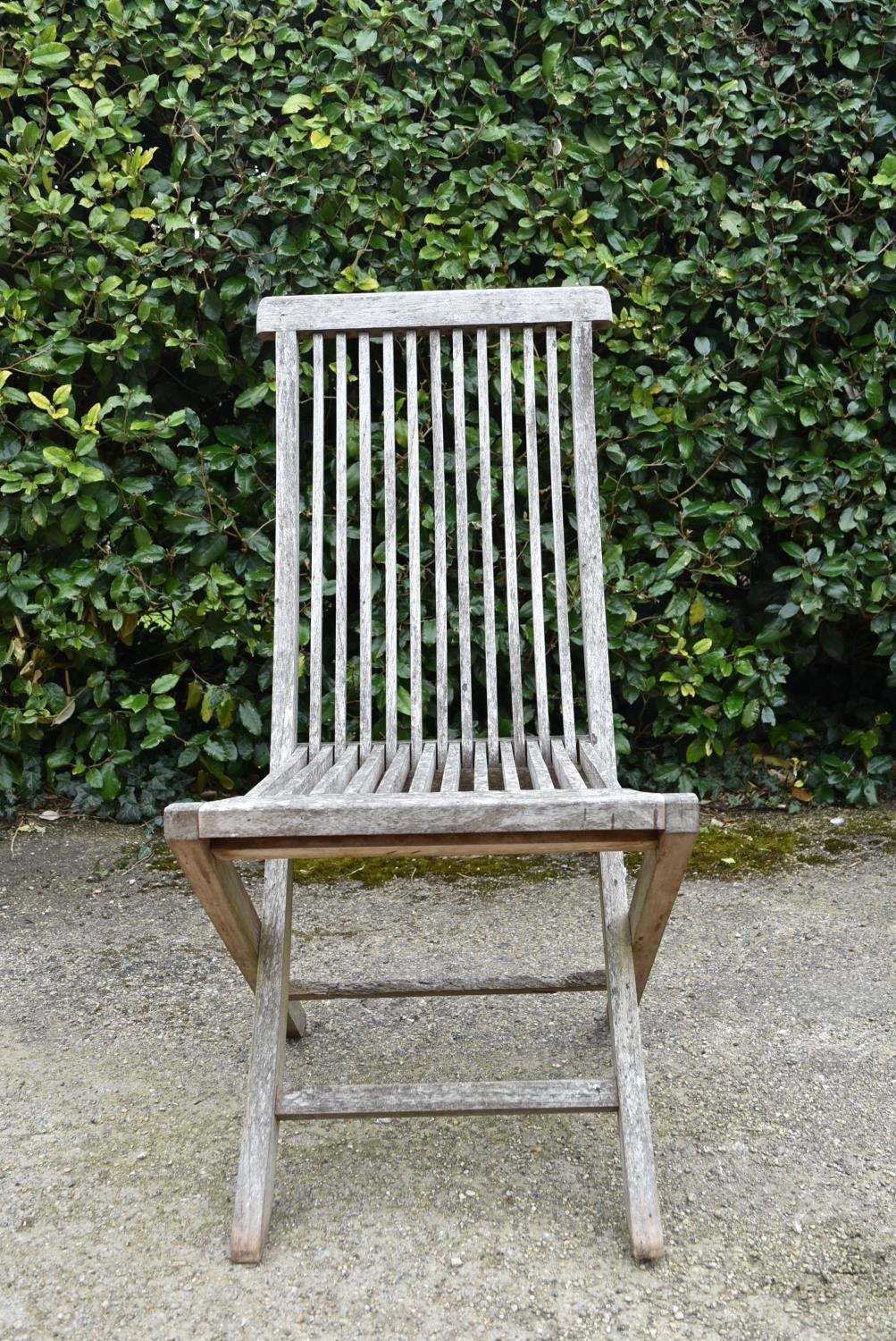 A set of five weathered teak folding and slatted garden chairs. H.99 W.46 D.43cm - Image 3 of 7