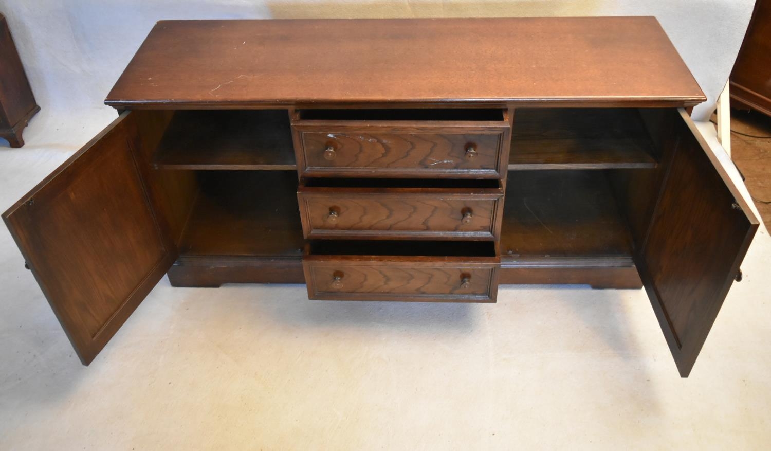 A mid century country antique style oak sideboard with a central bank of drawers flanked by linen - Image 5 of 11