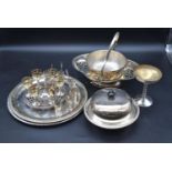 A collection of early 20th century silver plate. To include a six seating caviar set, a two tier