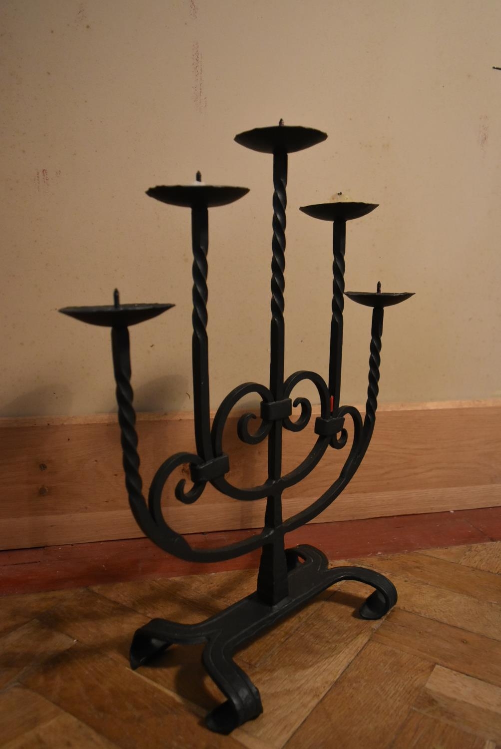 A 20th century five branch iron candelabra, stylised with twist branches and swirl design. H.54 W. - Image 4 of 7