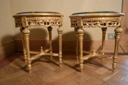 A pair of Louis XVI style lamp tables with inset marble tops on carved gilt wood bases. H.52 W.50cm