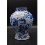An 18th century Chinese Kangxi (1662-1722) baluster vase with all over figural decoration. (no