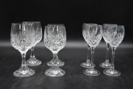 Two sets of four 20th century wine glasses. Four large cut crystal glasses along with four small cut