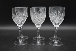 A set of six Stuart cut crystal wine glasses. H.19 Dia.8cm