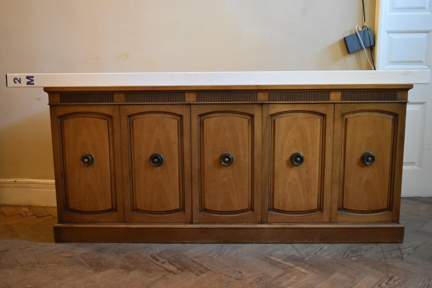 A walnut sideboard with panelled doors enclosing fitted interior on plinth base. H.76 W.170 D.48cm - Image 9 of 9