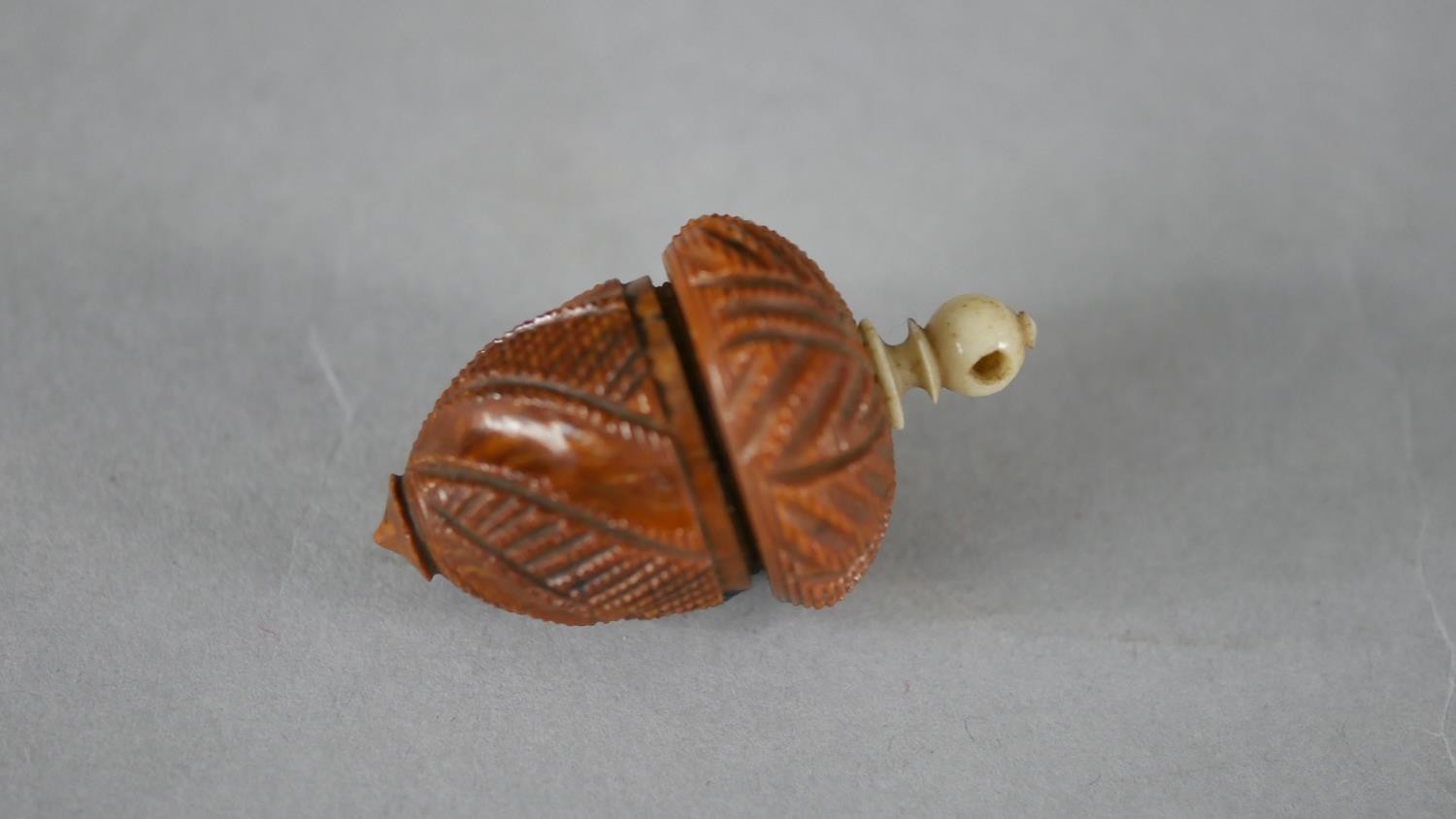 Three 19th century coquilla nut acorn design thimble holders. Each with a repeating foliate design - Image 4 of 7