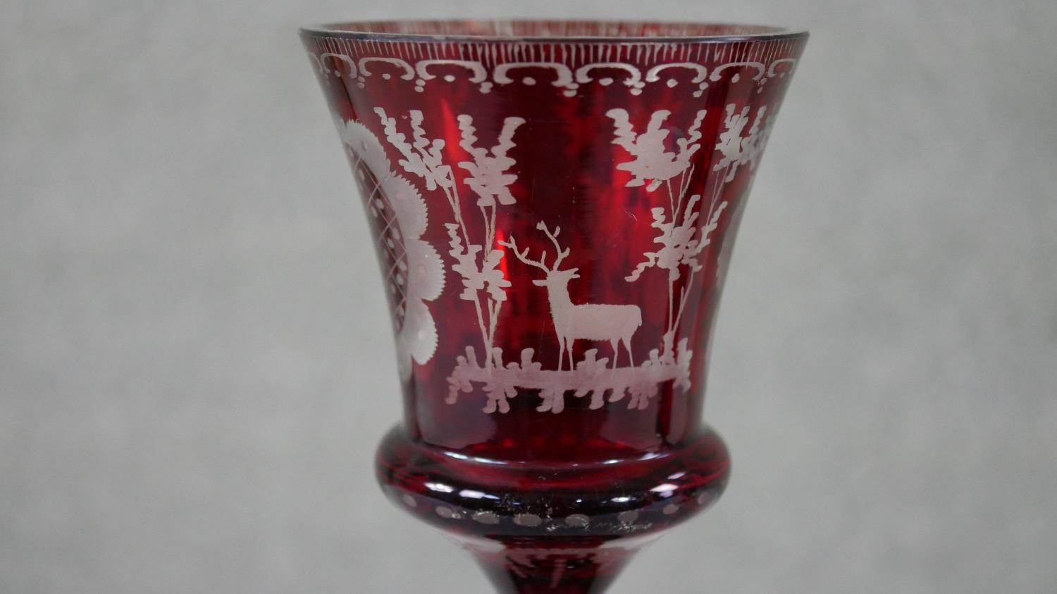 Two early 20th century Bohemian ruby cut to clear glass engraved goblets. One decorated with - Image 2 of 6