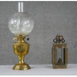 Two brass lamps. Including a Victorian brass oil carriage lamp along with a Duplex brass oil lamp