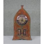 A Diane McCormick pottery clock in the form of a clock tower with double opening doors and battery