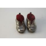 Two miniature novelty Danish silver boot pin cushions. With red velvet cushions. Stamped T.F.925S.