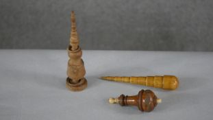 A collection of 19th century treen items. Including a hardwood and bone bell pull, carved spire