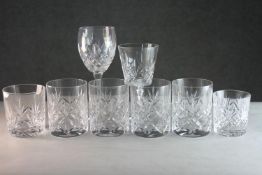 A collection of eight cut crystal glasses. Including a set of four whisky tumblers, two glasses