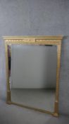A 19th century giltwood and gesso overmantel mirror with husk and swag decoration and original plate