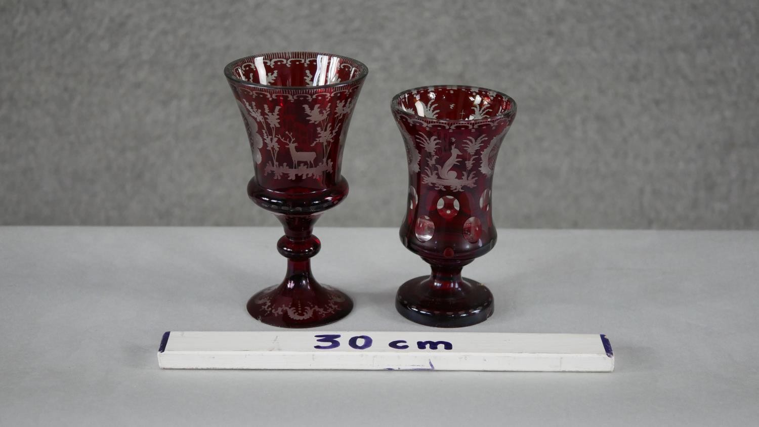 Two early 20th century Bohemian ruby cut to clear glass engraved goblets. One decorated with - Image 6 of 6