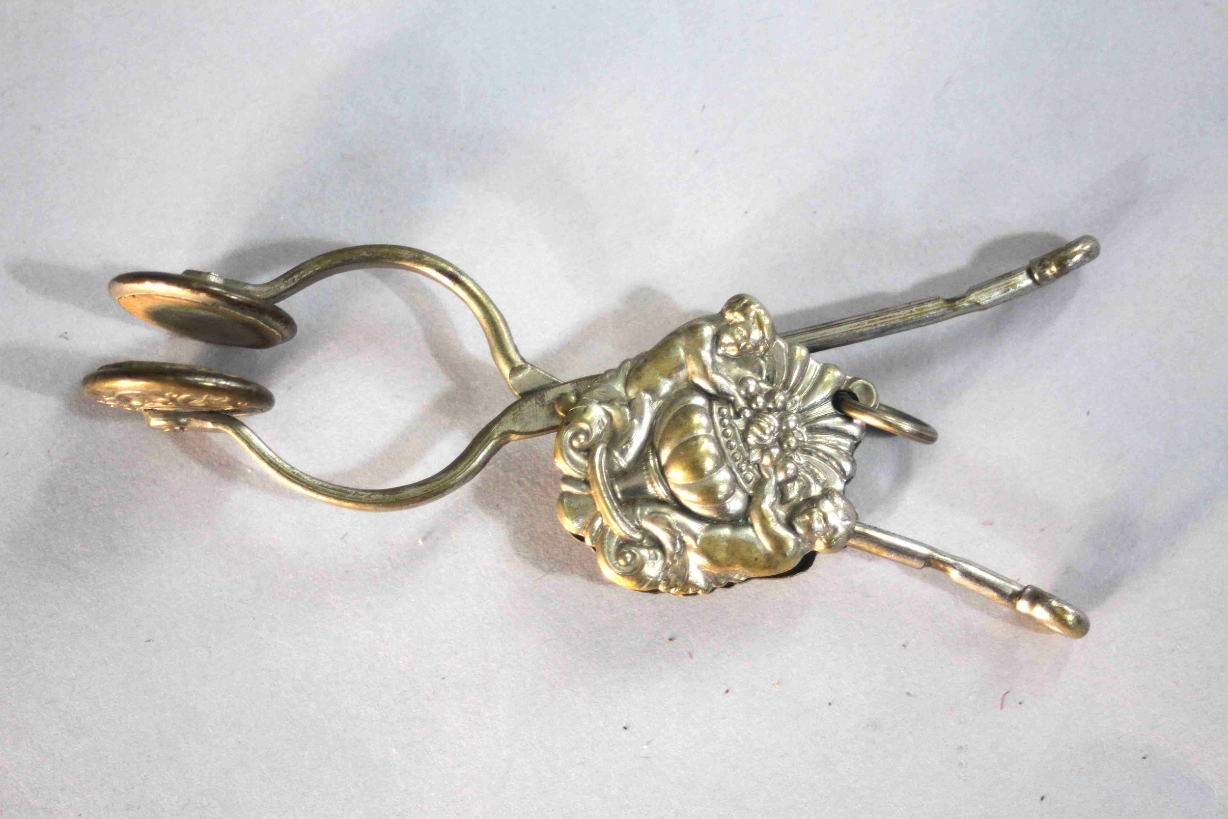 A Victorian silver plated skirt lifter with an urn and fruit design along with a Danish silver - Image 2 of 10