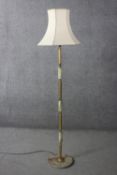 A mid century vintage brass and onyx standard lamp and shade. H.173 Diam. 50 cm.