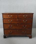 A Georgian mahogany chest with brass swan neck handles on shaped bracket feet. H.90 W.103 D.50cm