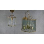 Two Victorian style brass and glass hexagonal lanterns with etched star motifs. One with four