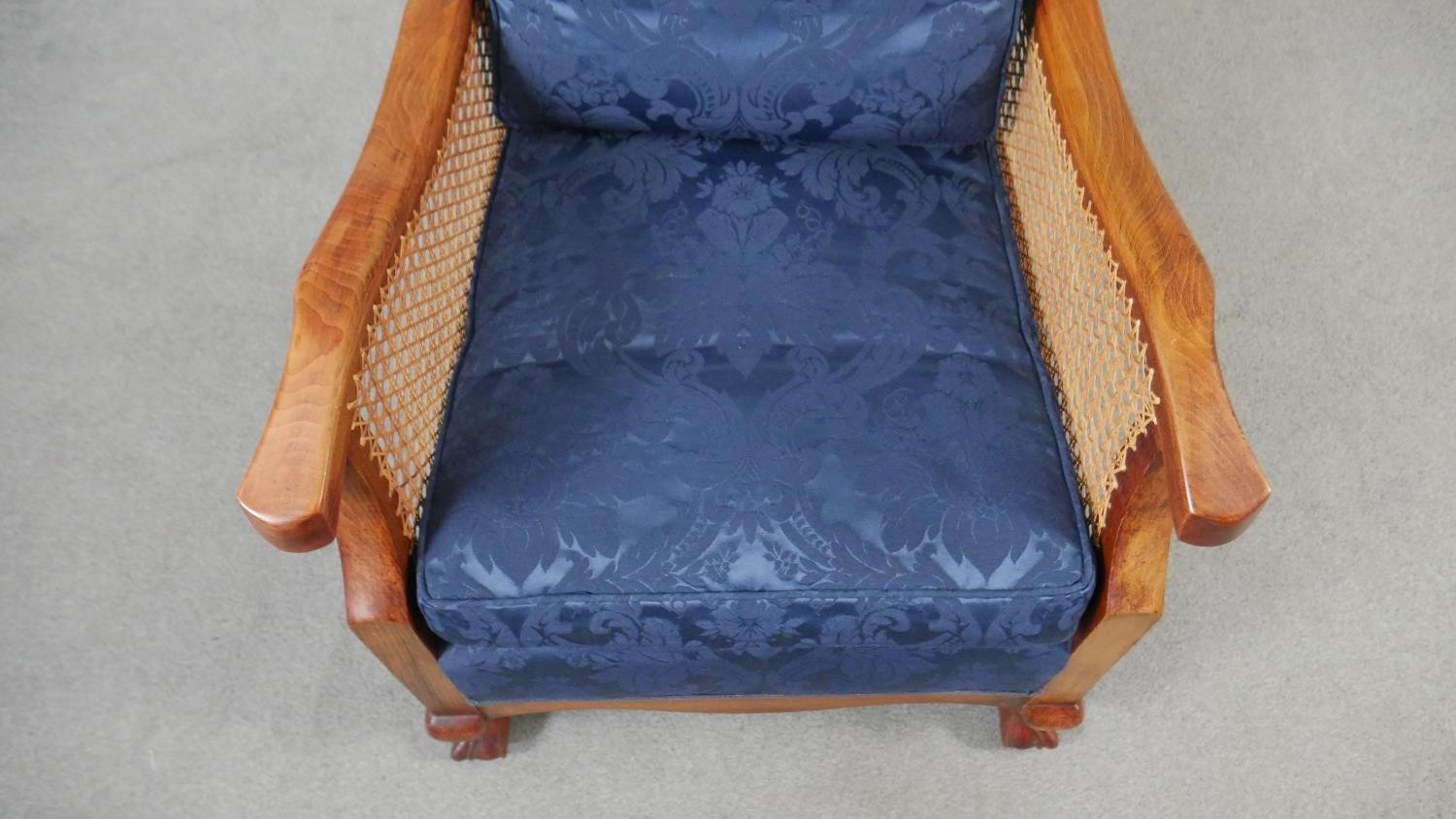 A pair of mid century vintage beech bergere armchairs with caned backs and sides on carved - Image 6 of 8