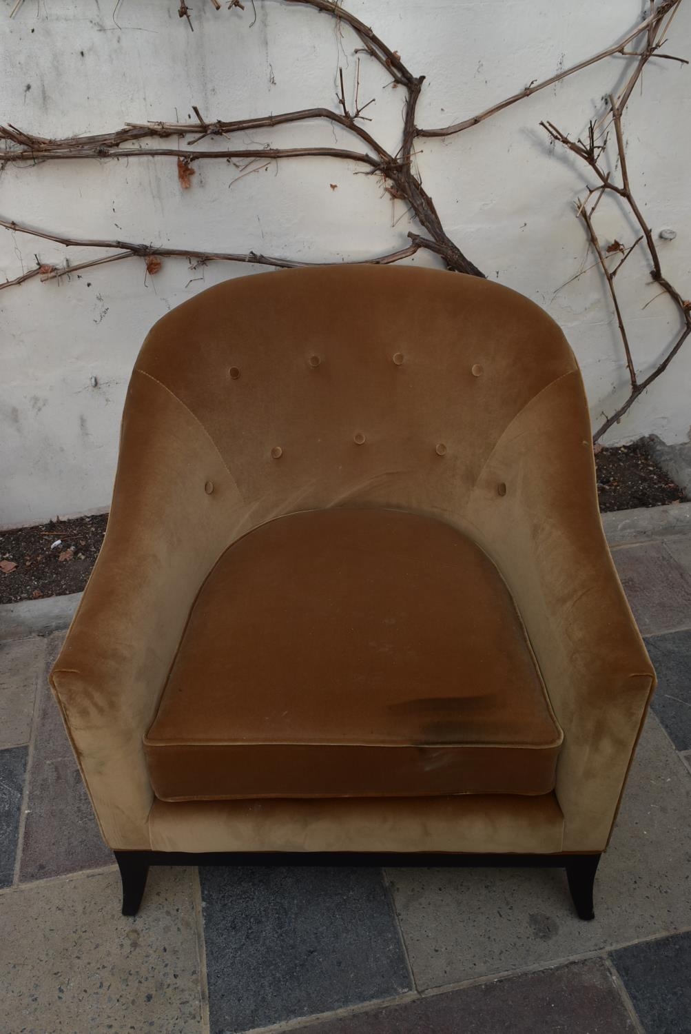 A contemporary tub armchair in buttoned upholstery on sabre supports. H.79 W.77 D.64cm - Image 2 of 4