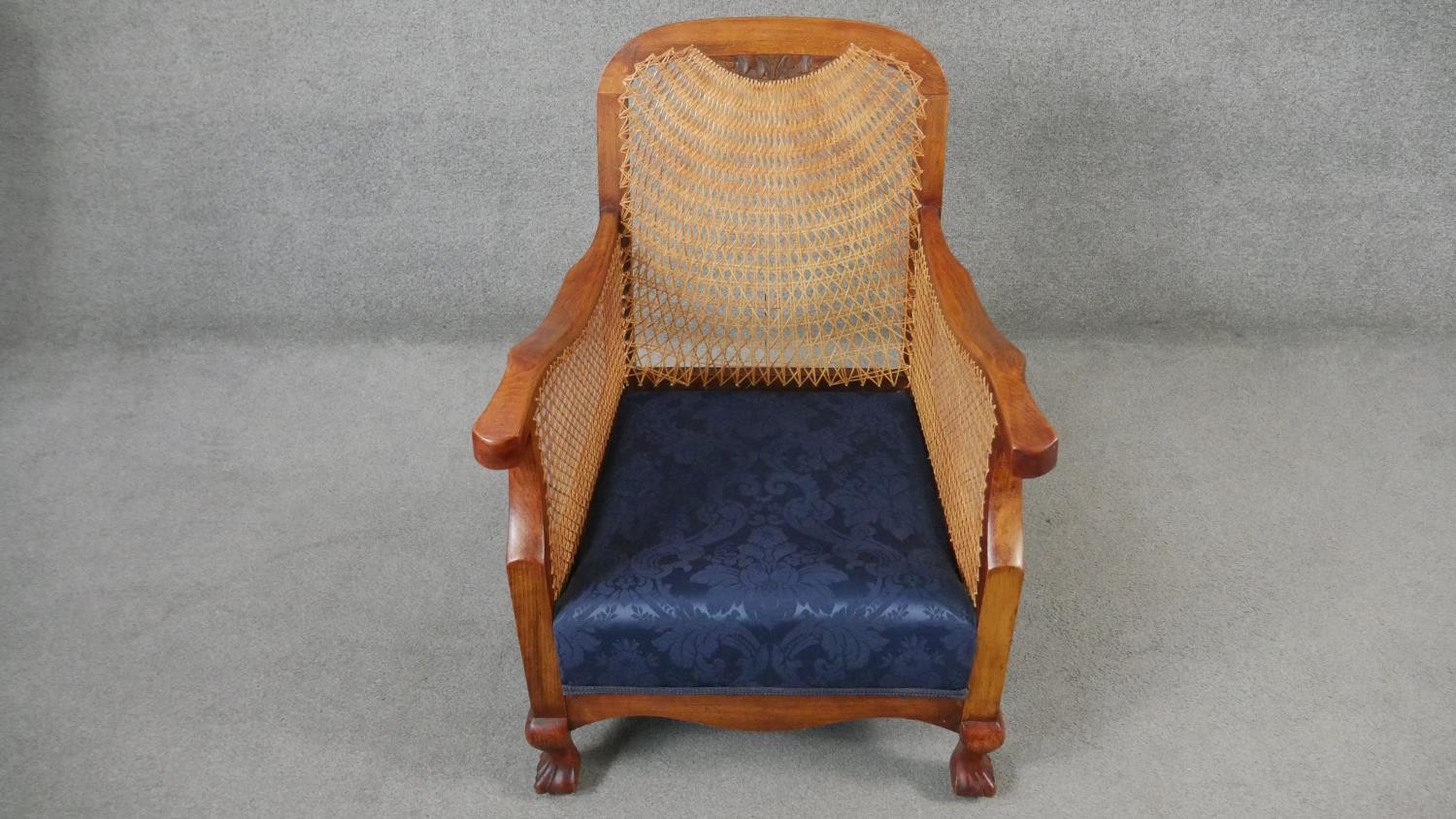 A pair of mid century vintage beech bergere armchairs with caned backs and sides on carved - Image 7 of 8