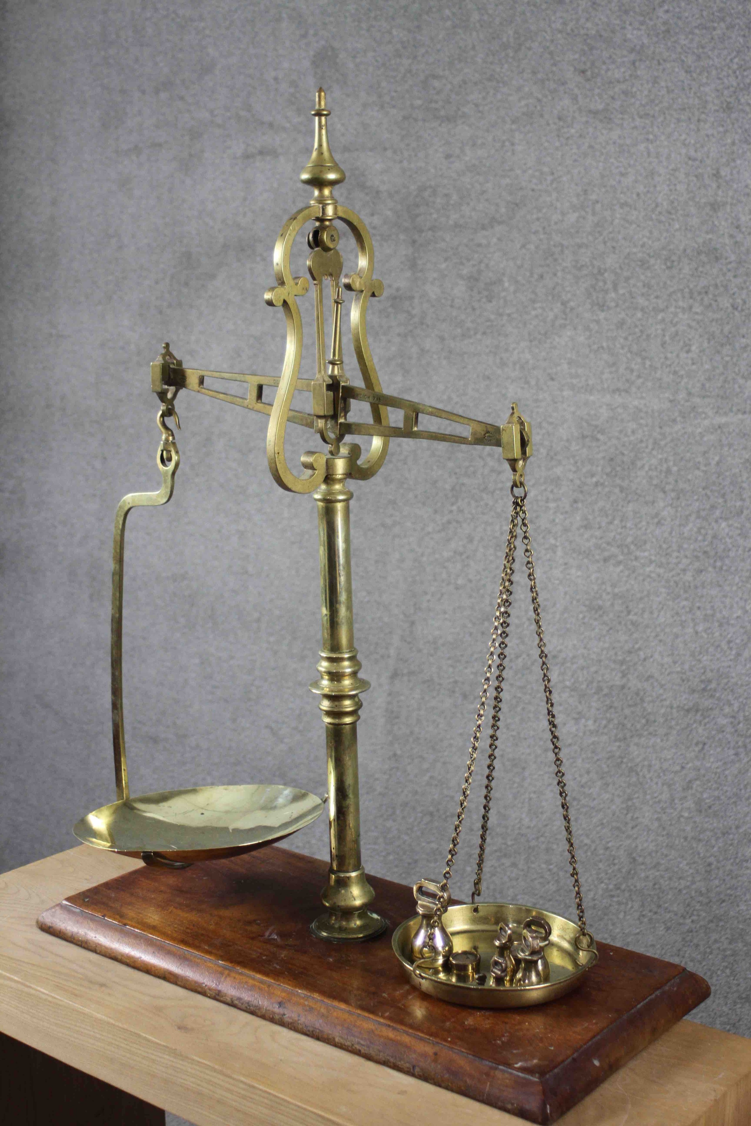 A set of large Victorian Parnall & Sons of Bristol brass and oak shop scales with weights. Impressed - Image 2 of 6