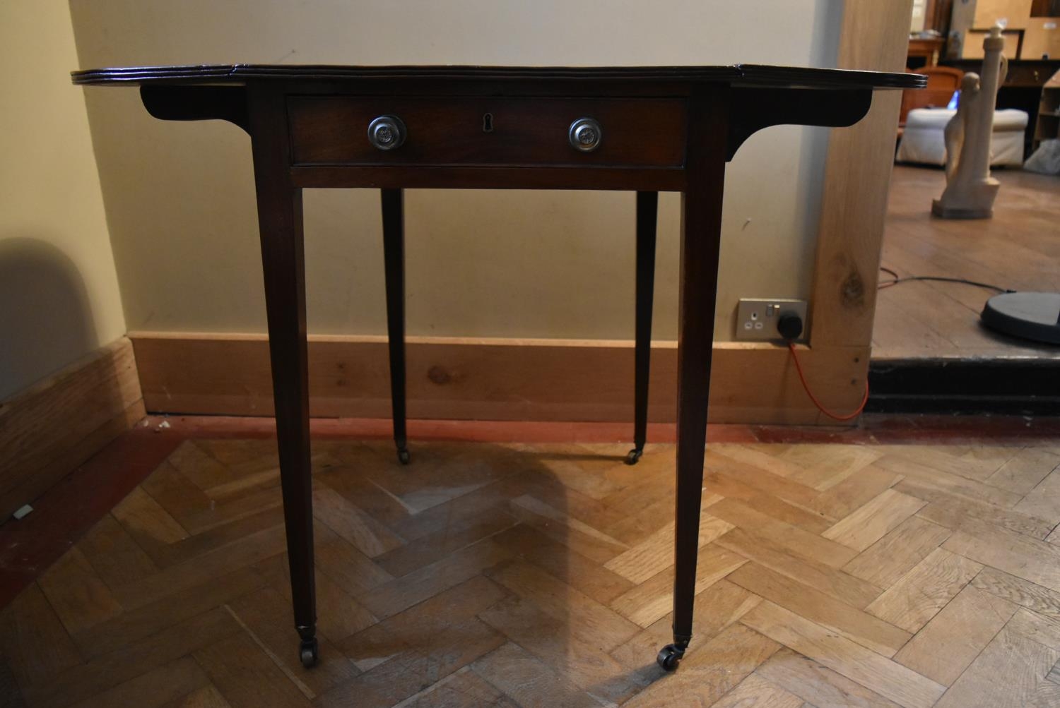 An early 19th century mahogany drop flap Pembroke table on square tapering supports terminating in - Image 7 of 7