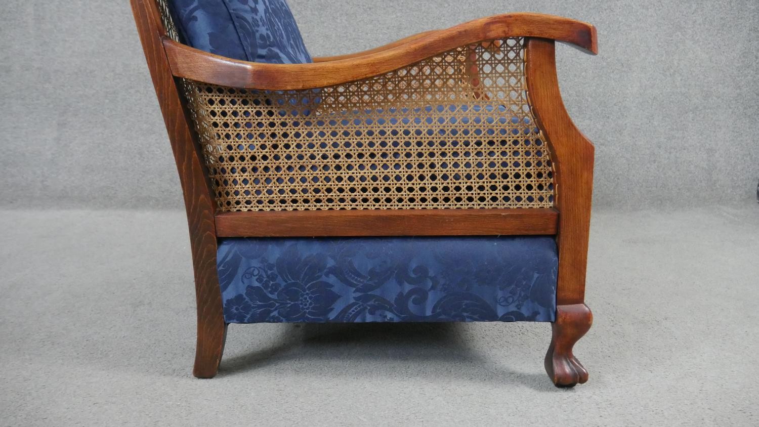 A pair of mid century vintage beech bergere armchairs with caned backs and sides on carved - Image 4 of 8