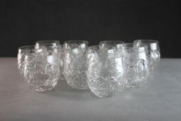 Twelve cut crystal foliate design handled punch cups. Star cut design to base. H.7 Diam.27cm.