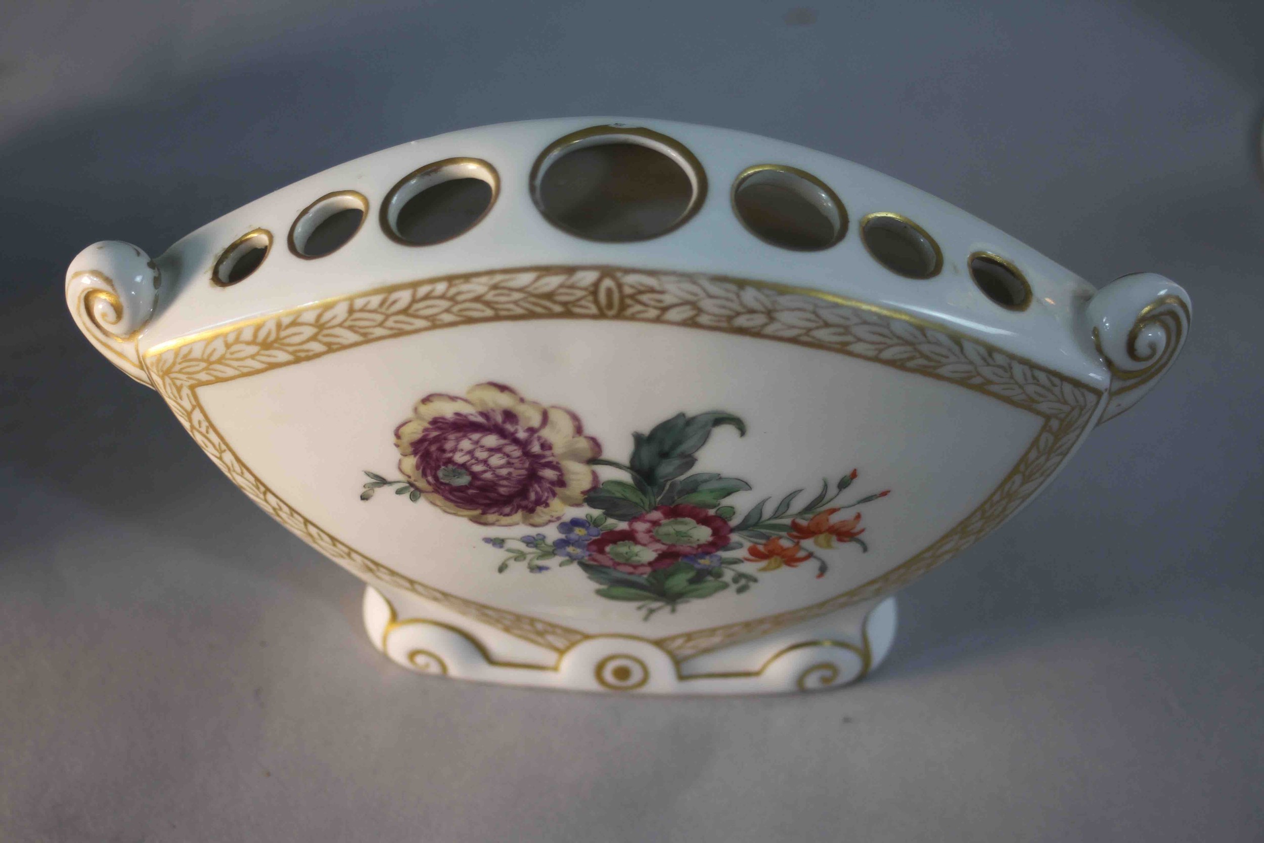 A collection of four pieces of porcelain. Including a gilded floral design flower vase, a Royal - Image 4 of 9