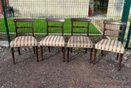 A set of four late Georgian mahogany bar back dining chairs