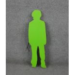 A neon green and white acrylic light in the form of a figure. H.73 W.22 D.4cm