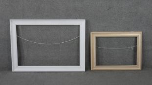 Two wooden frames, one painted white. H.77 W.106cm (largest)